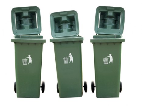 Mixed recycling bins and separation signage in a central London business